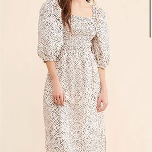 Free people dress. Originally 200. Never used.